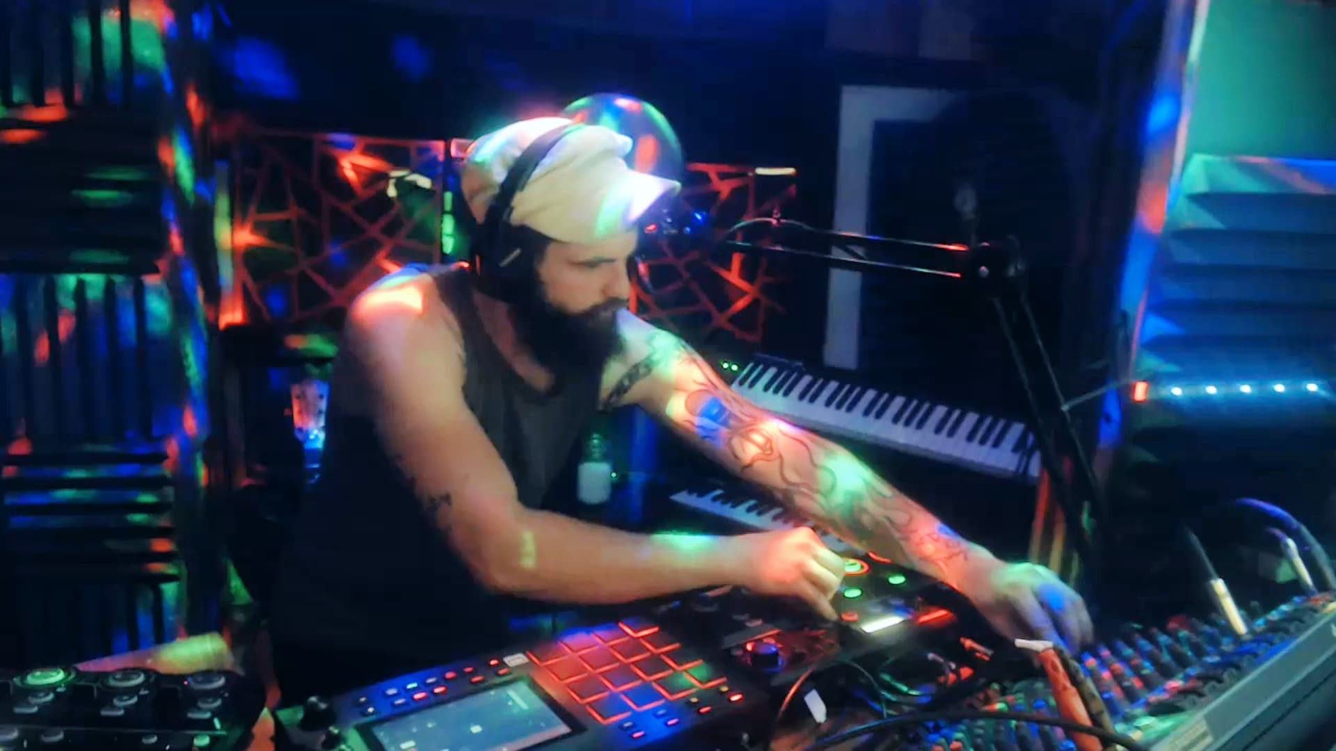 VØBØRNY live performance with microphone and electronic equipment setup